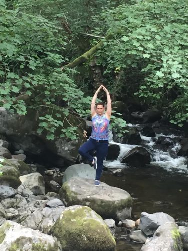 yoga pose on rock